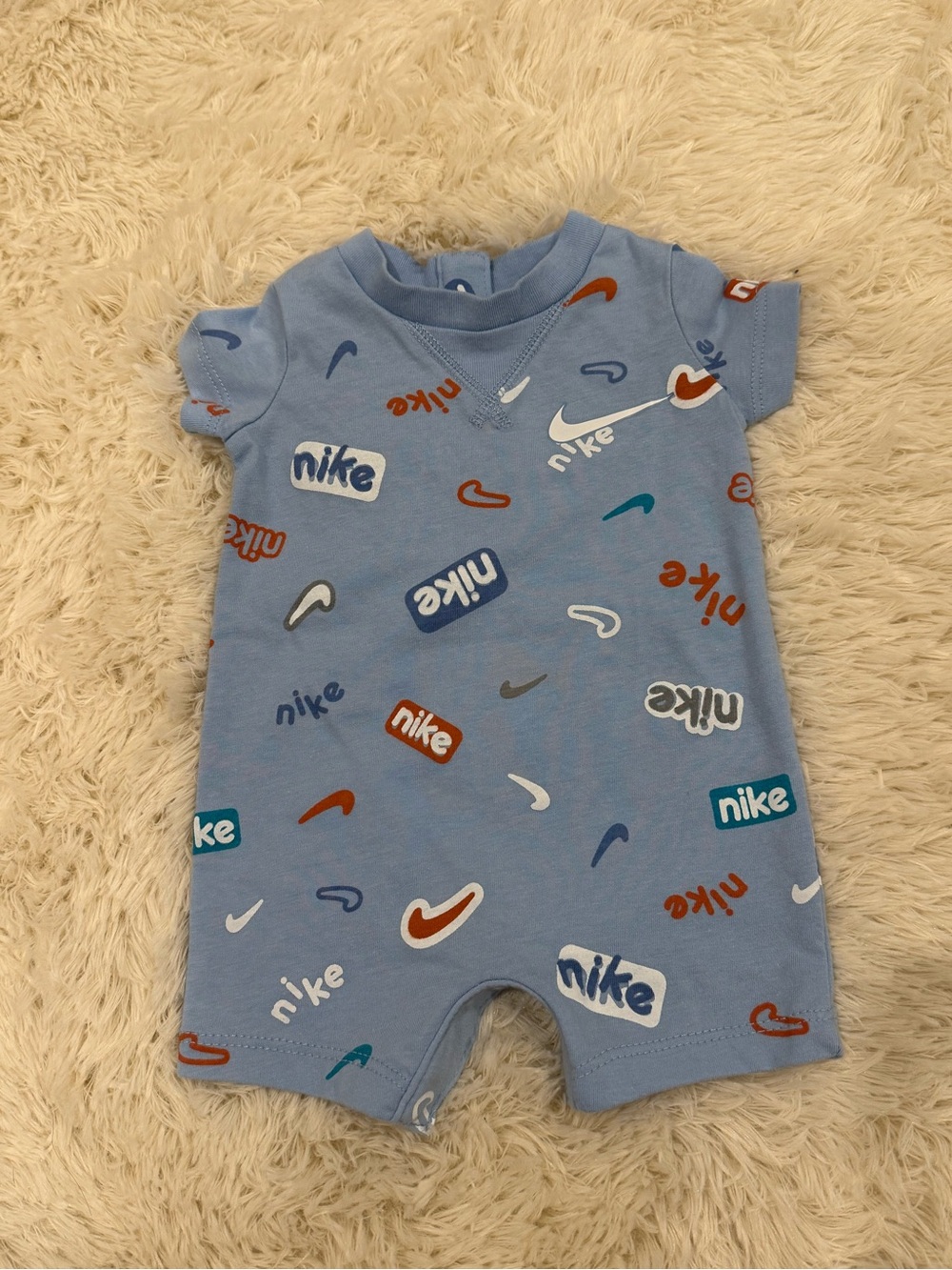 Nike Light Blue All-Over Logo Short-Sleeve One-Piece